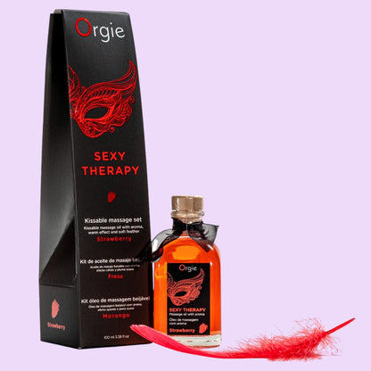 Набір для масажу Orgie – Sexy Therapy Strawberry (100 мл), їстівна розігрівальна олія + пір'їнка