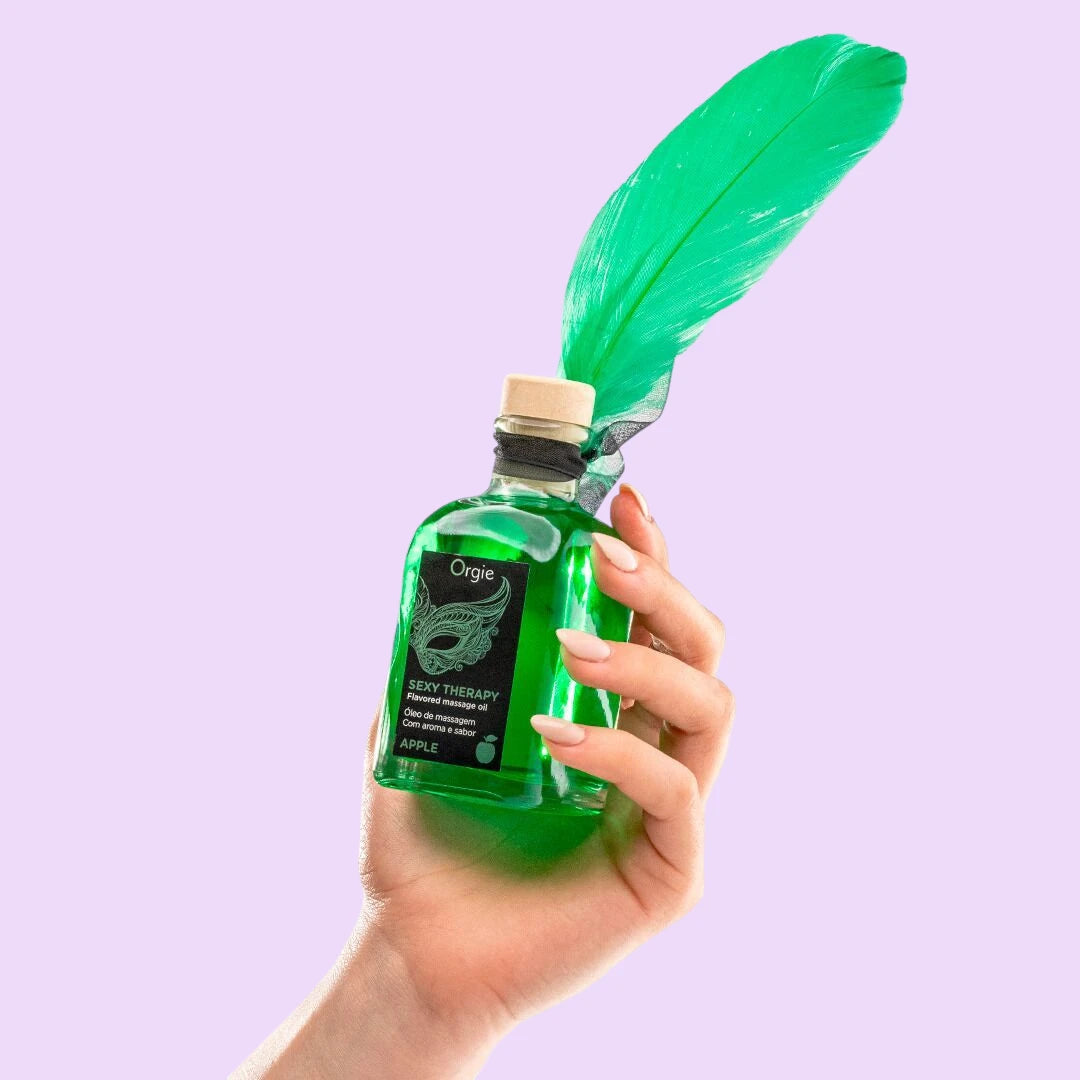 Набір для масажу Orgie – Sexy Therapy Apple (100 мл), їстівна розігрівальна олія + пір'їнка